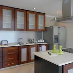 Den Laman Condominiums