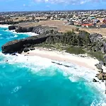 The Gem Is Located A Few Minutes Walk To The Gorgeous Bottom Bay Beach