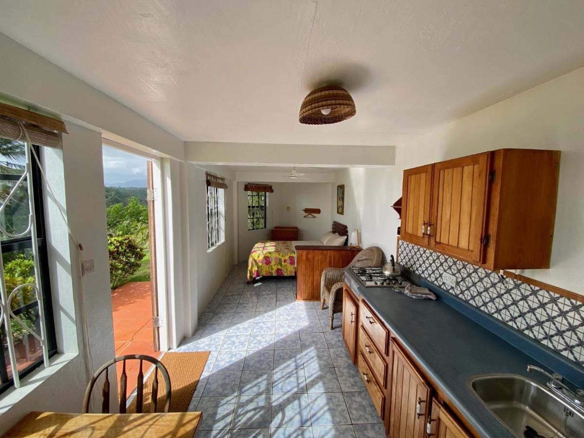 Sea Cliff Eco-cottages & Gin Distillery Holiday home Calibishie
