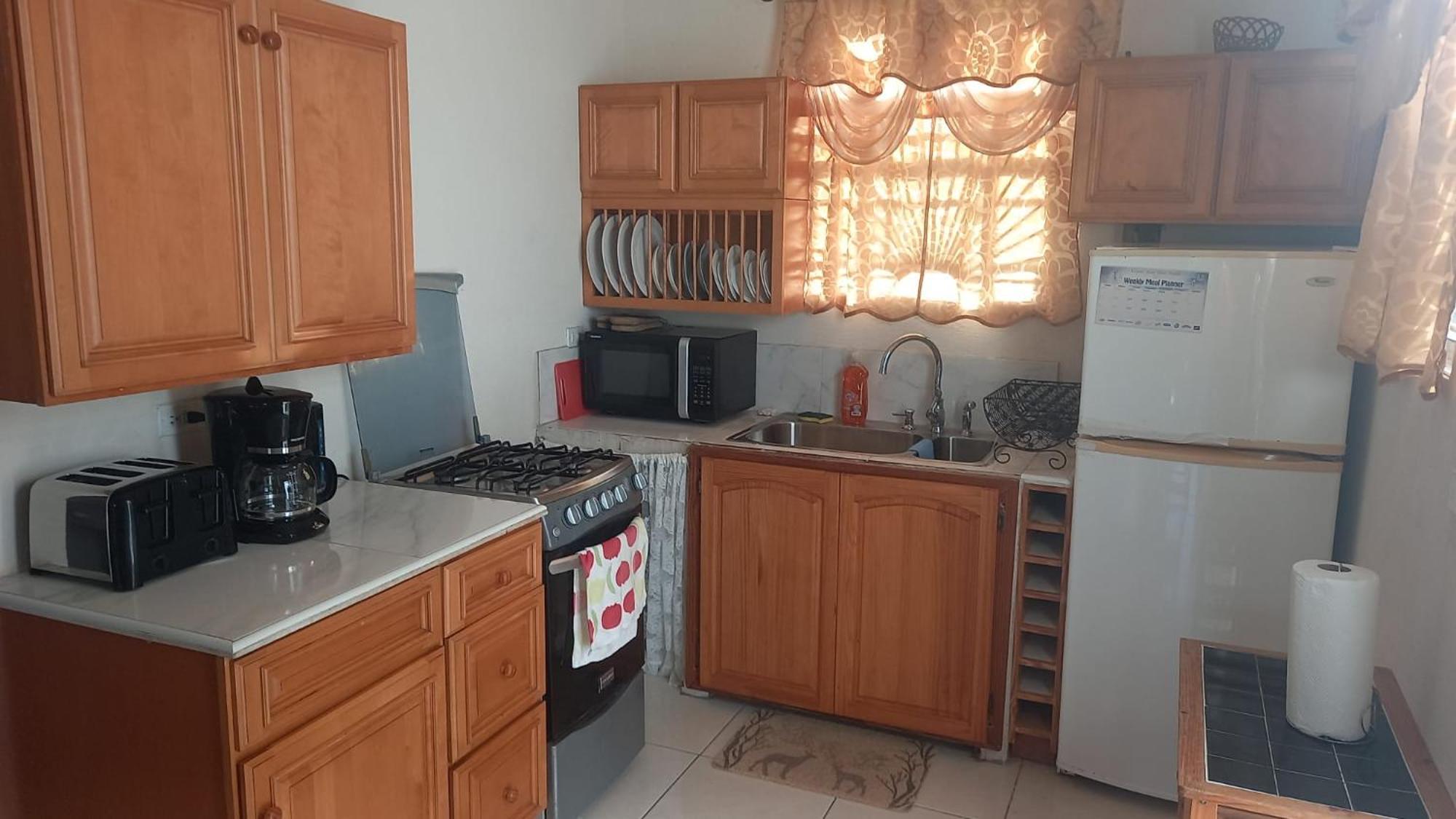 One Bedroom 1 Minute Walk To West Coast Beach! Apartment