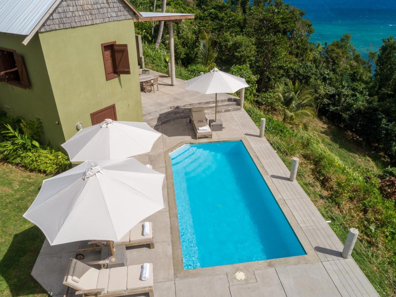 Pagua Bay House - Oceanfront Cabana's Marigot
